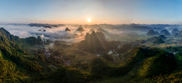 Panoramic view of mountains against sky during sunset