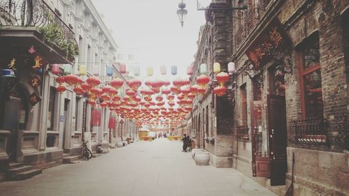 Lanterns hanging in city