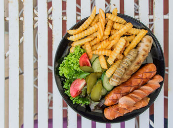 High angle view of vegetables on barbecue grill