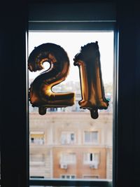 Close-up of number on window