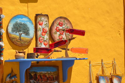 High angle view of multi colored chairs on table against wall