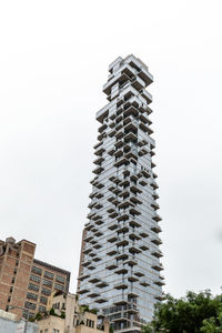 Low angle view of modern building against sky