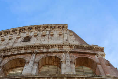 Low angle view colosseum  against sky