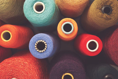 Composition of colorful vibrant wool threads from above. autumn colours