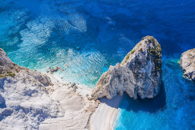 High angle view of rock formation in sea