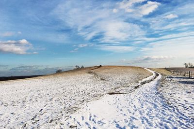 Tranquil view of snow covered landscape