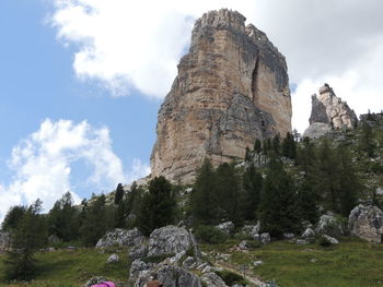 Low angle view of rock formations against sky