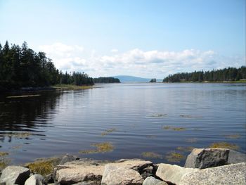 View of lake against cloudy sky