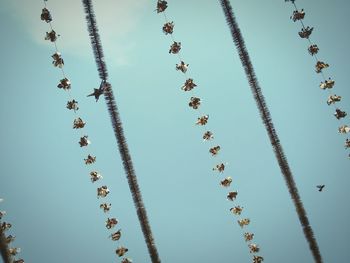 Low angle view of decoration against clear sky