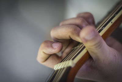 Close-up of playing the guitar