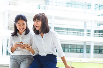 Young woman using mobile phone