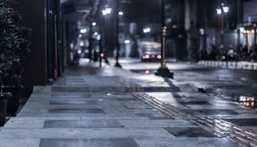 Wet street at night