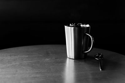 Close-up of coffee cup on table