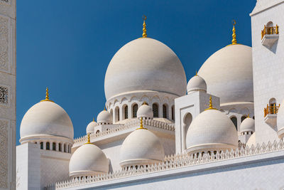 Sheikh zayed grand mosque in abu-dhabi. view of cathedral against clear blue sky. 