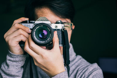 Portrait of man photographing