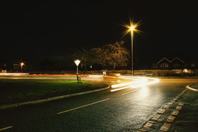 Light trails on road at night