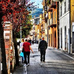 People walking on street in city