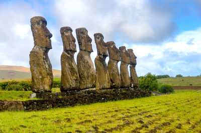 Ahu akivi at rapa nui national park against sky