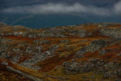 Scenic view of landscape and mountains against sky