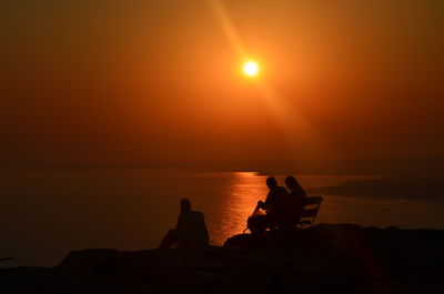 Scenic view of sea at sunset