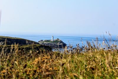 Scenic view of sea against clear sky