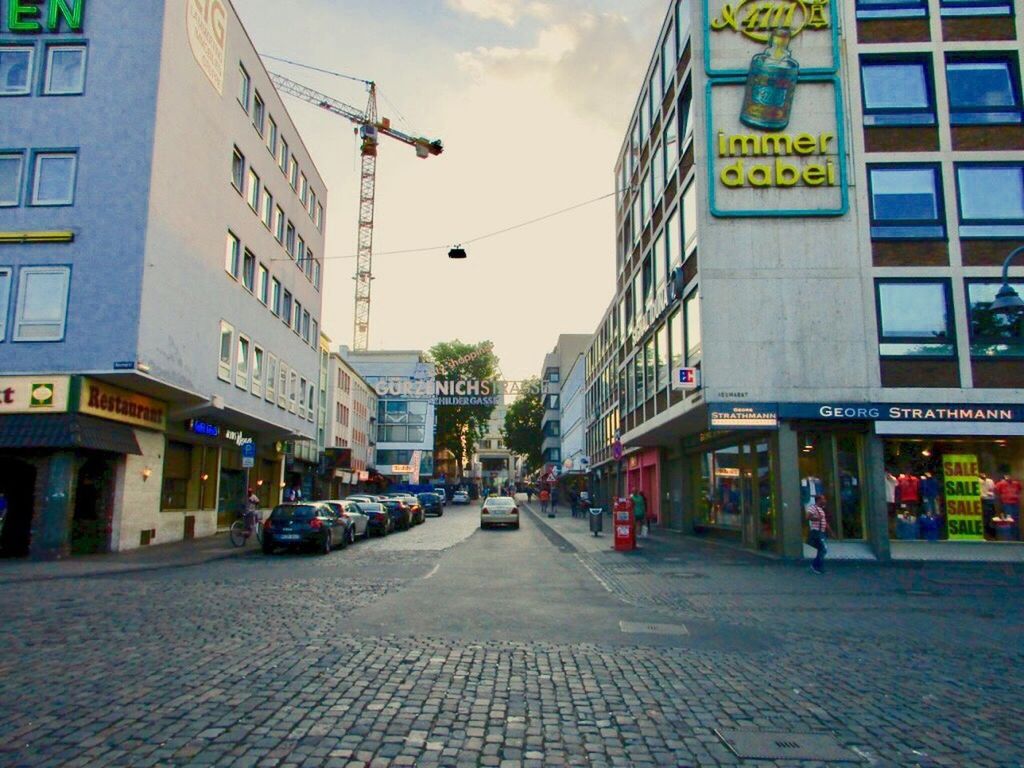 VIEW OF CITY STREET AND BUILDINGS