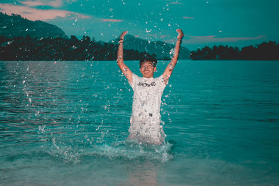 Man standing in swimming pool