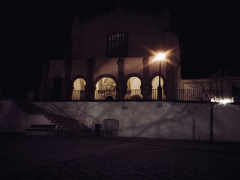 Illuminated building at night