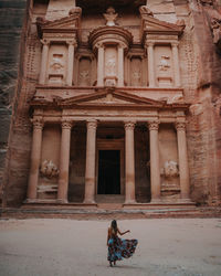 Woman in front of petra