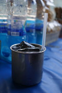 Close-up of glass of jar on table