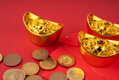 High angle view of coins on white background