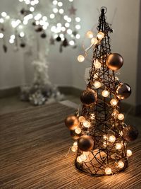 Close-up of illuminated christmas lights on table
