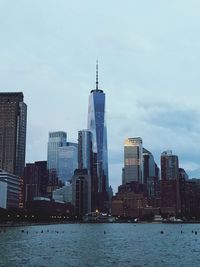 Modern buildings in city against sky