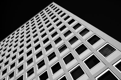 Low angle view of office building against sky