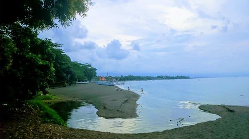 Scenic view of beach against sky