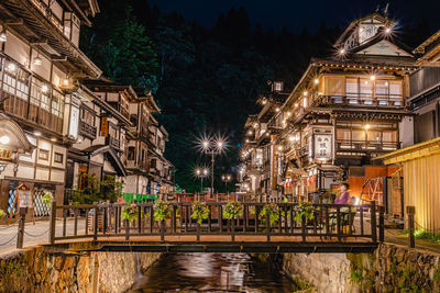 Famous ginzan onsen street light up at night, hot spring in the mountains of yamagata prefecture