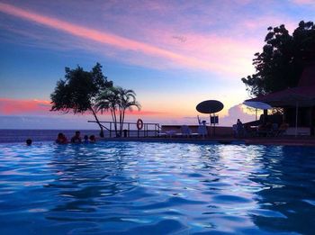 Scenic view of sea at sunset