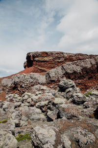 Low angle view of rocky slope