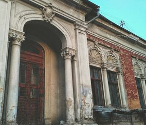 Low angle view of old building against sky