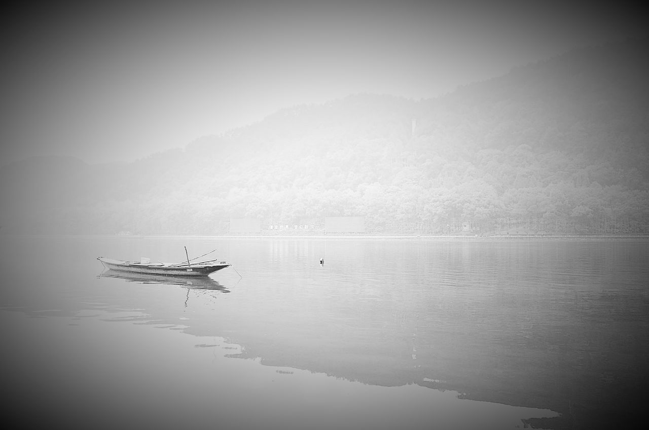 nautical vessel, transportation, mode of transport, water, boat, waterfront, tranquil scene, sailing, scenics, tranquility, lake, nature, beauty in nature, travel, reflection, moored, sky, journey, sea, outdoors