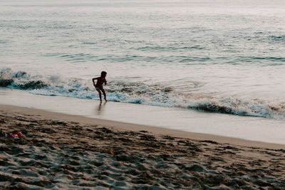 Full length of man on beach