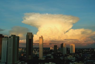 Cityscape against sky during sunset