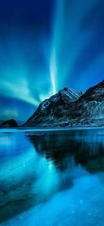 Scenic view of sea against sky at night