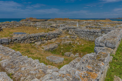 Rock formations on landscape against sky