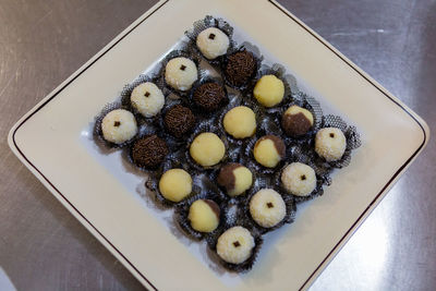 High angle view of cookies in plate on table