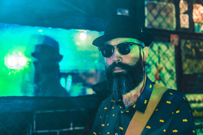 Bearded man near the mirror