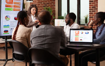 Group of people working on table