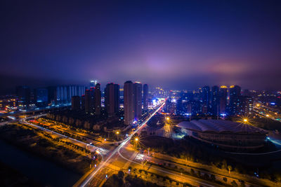 Illuminated cityscape at night