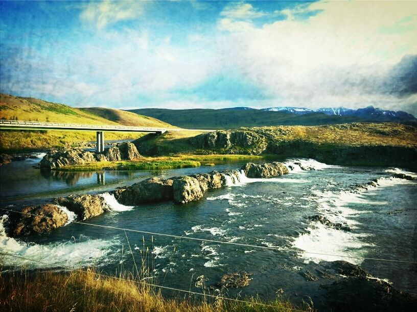 water, sky, cloud - sky, mountain, river, built structure, tranquility, tranquil scene, scenics, bridge - man made structure, cloud, connection, nature, cloudy, architecture, beauty in nature, transportation, lake, day, landscape