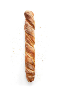 Close-up of cake against white background